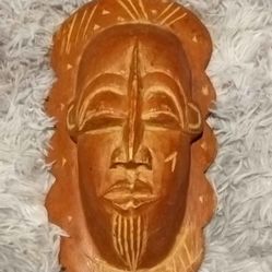 Hand crafted wooden mask