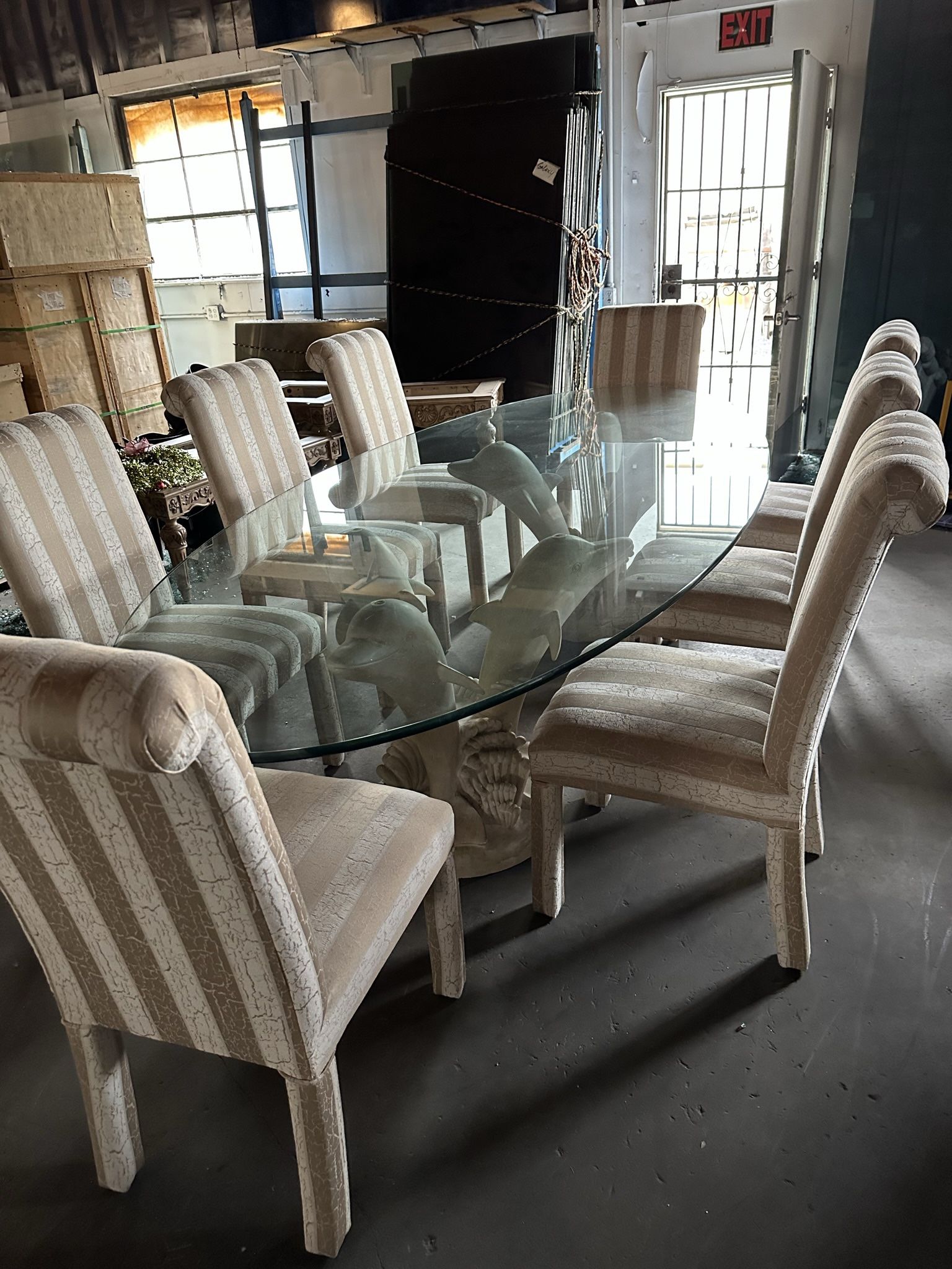 Unique Glass Top Dolphin Base, Eight Piece Dining Room Set
