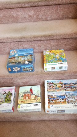 PUZZLE LOT...8 500/550 PC