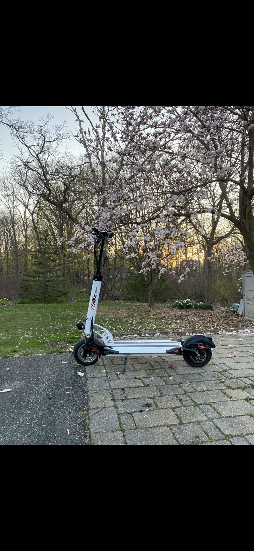 EMOVE Cruiser 52V 1600W Dual Suspension Foldable Scooter (Danvers, MA)