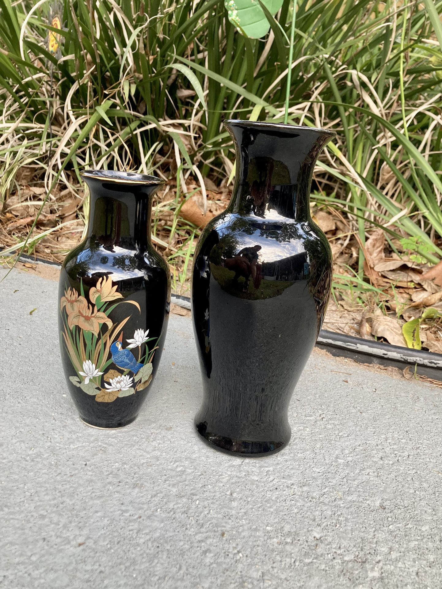 Pair of black decorative oriental vases 