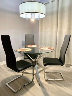Glass table with chairs