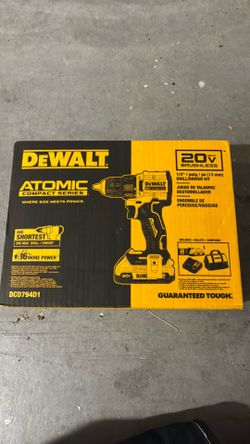 DeWalt drill atomic series, battery, charger, and tool bag included
