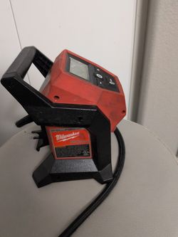 Milwaukee M12 Compact Inflator (Model 2475-20).