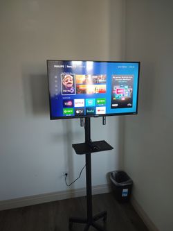 Philips Roku Smart TV on Rolling Floor Stand