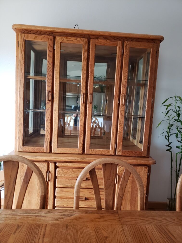 Oak china cabinet, dining table and chairs. Set for $589 OBO