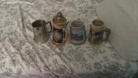 Set of 4 Vintage Beer Steins