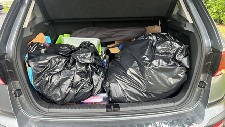Two large bags of mix clothes and shoes
