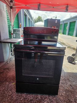 G/E black glass stove