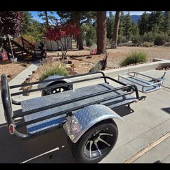 2013. Motorcycle, tow behind trailer. 24 inches in width 60 inches in length. Diamond plate. Cooler rack, clean, with California PTI plate. 1 7/8” bal