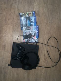 PS4 with head set and games