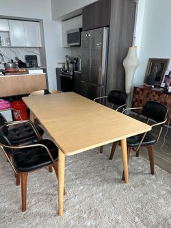 Solid wood extendable dining table (47 to 63”)