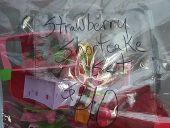 Strawberry shortcake small figures and dollhouses all in one package $40
