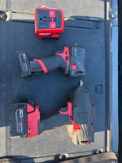 Milwaukee Impacts w/batteries and charger