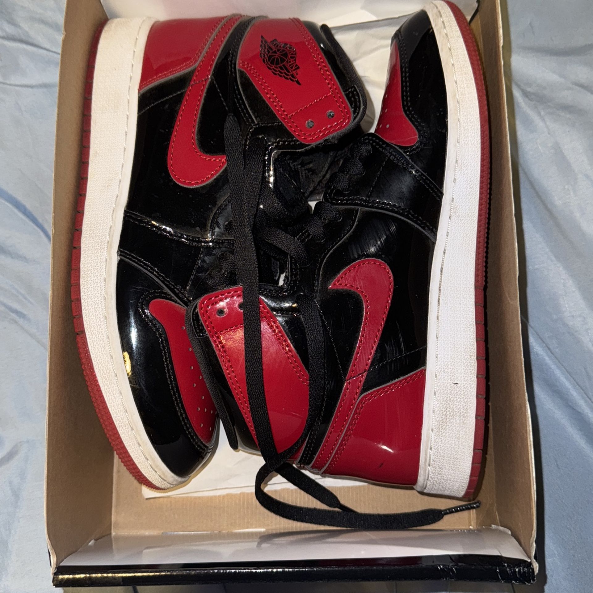 Jordan 1 Black Varsity Red