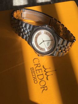 CREDOR , Pacific 18k white gold bazel 35x37mm