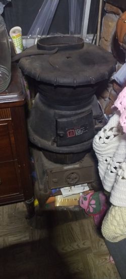 Cast iron wood burner, not complete with pipe