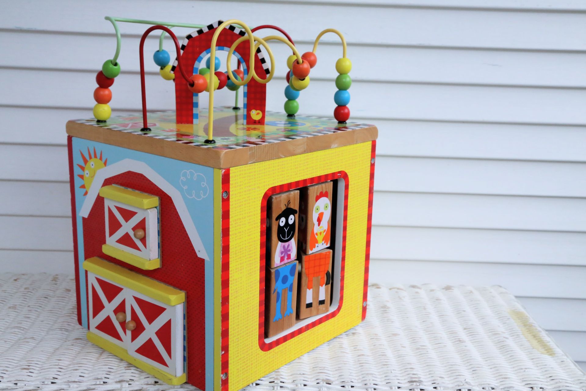 Alex Jr. Large Wooden Activity Cube - Busy Box for Babies & Toddlers - ABC's, Farm, Wooden Bead Balls, Spinners, Doors, Etc.