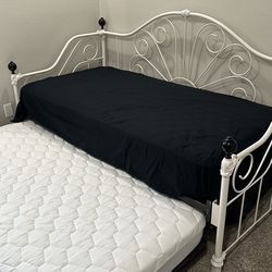 Twin Day bed with trundle and new mattresses