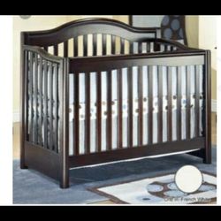 Crib And Dresser with hutch.