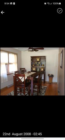 Dining room table, matching hutch and six chairs.