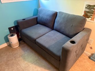Grey Loveseat w/ Pullout bed and integrated USB ports