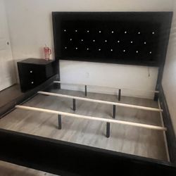 bedframe and bedside table