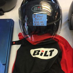 Harley Davidson helmets for sale and one belt and one bell rest Harley