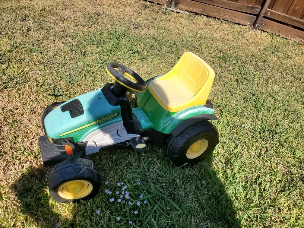 Kids riding tractor