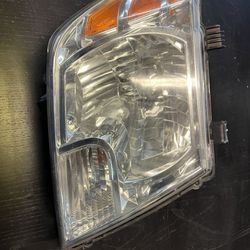 15 Frontier Driver Headlight 