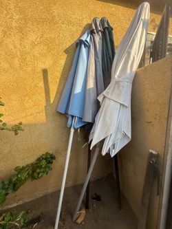 4 umbrellas “as is”