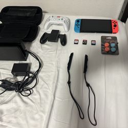 Nintendo Switch – OLED Model w/Neon Red & Neon Blue Joy-Con