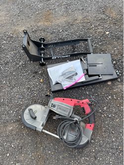 Bauer band saw with table bench
