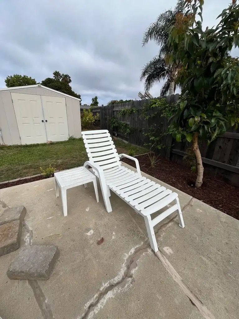White Plastic Outdoor Chaise Lounge Chair and Side Table