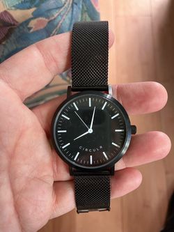 Circulr stainless steel watch