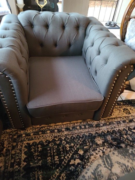 2 New charcoal arm Chairs