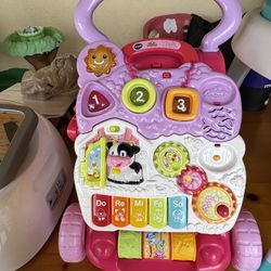 VTech Sit-to-Stand Learning Walker & Dinosaur Toy 