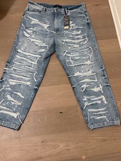 Heavily Distressed Light Wash Jeans with Tags