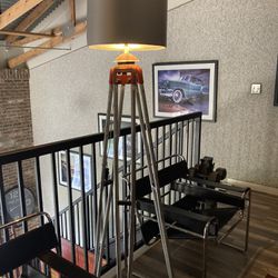 Industrial Tripod Floor lamp In Excellent Condition And A Conversation Piece. 