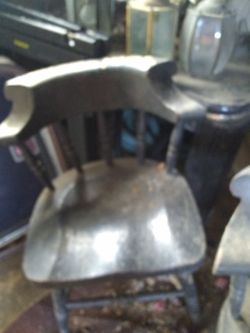 Wooden chairs heavy have two a like.