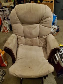 Glider rocker- needs cleaning or new cushions.