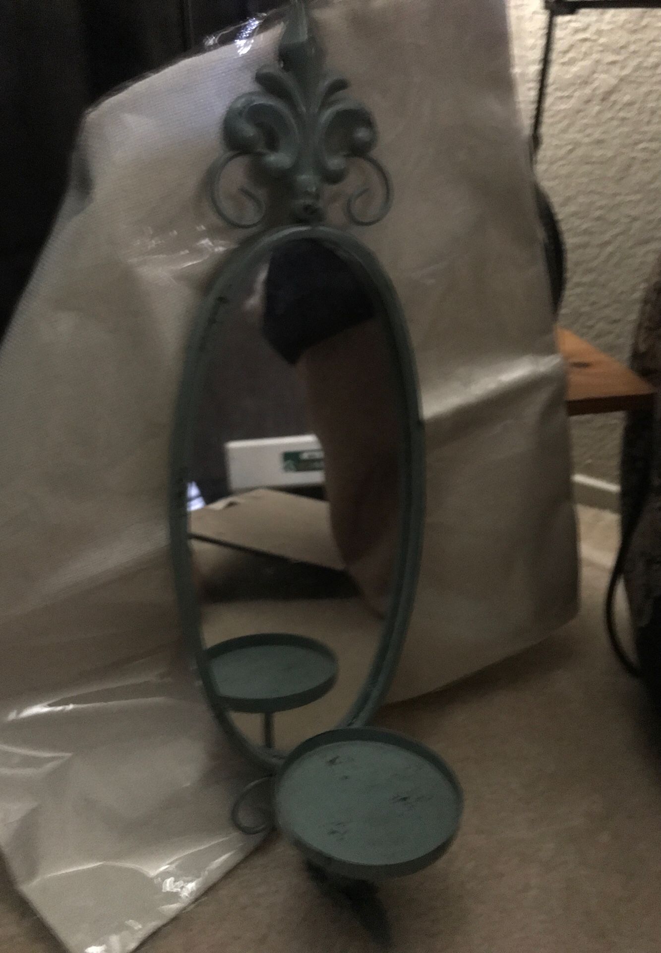 Mirror, candle holder