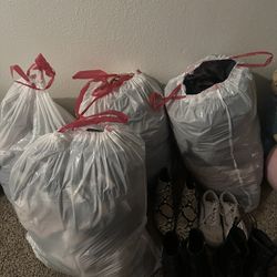 4 Bags Of Clothing 