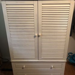 Bedroom armoire with mini shelf