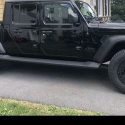 4 XD Rockstar 2 rims and Faulkan wild peak a/t3w 275 70/18 tires.