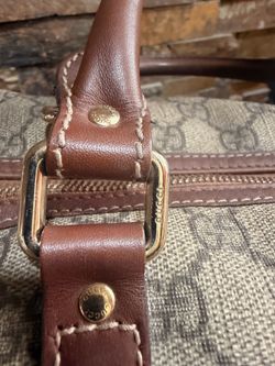 Gucci Joy Boston bag, signature GG supreme canvas with leather trims.