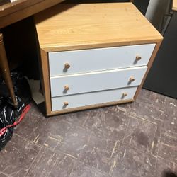 A Three Drawer Dresser 