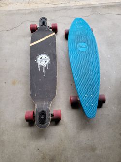 2 Long board skateboards (both hardly used - sold separately)