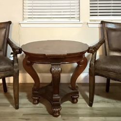 Coffee table and 2 wooden cushioned chairs