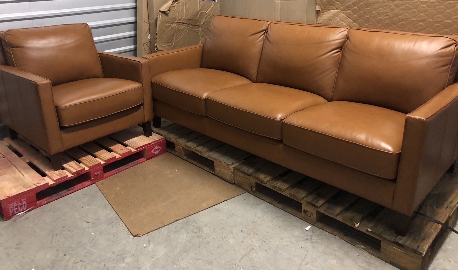 New West Park 2-piece Leather Set - Sofa and Chair Just unboxed, so cushions will puff out more. Retails for $3,200 Each piece is handmade by skil